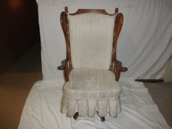 upholstered swivel rocker before