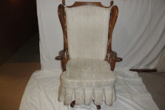 upholstered swivel rocker before